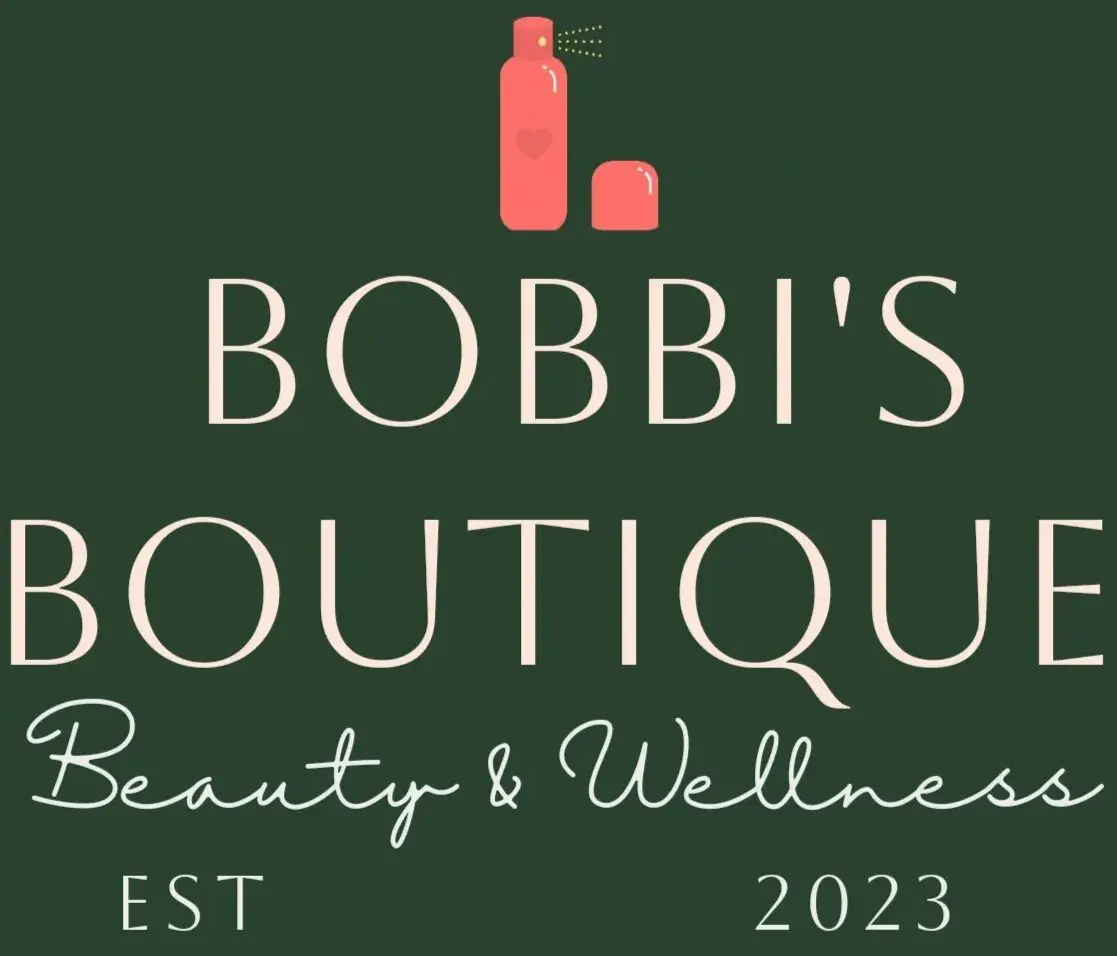A green sign that says bobbi 's boutique.